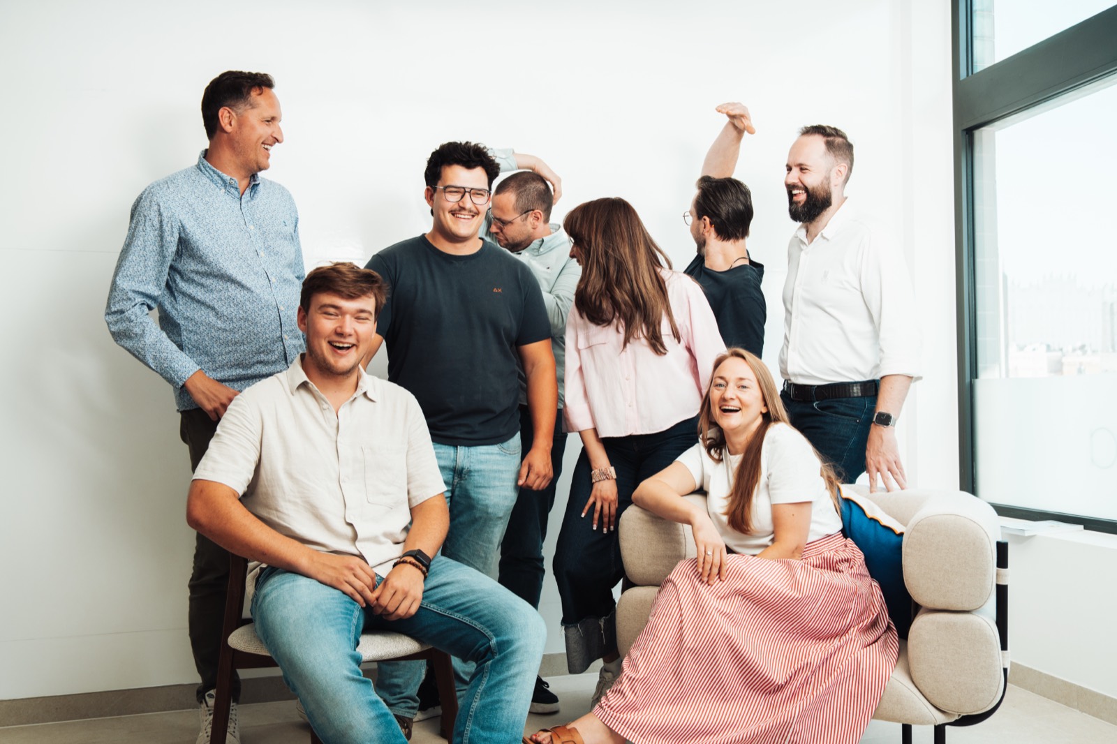The Agoya team laughing together at the office